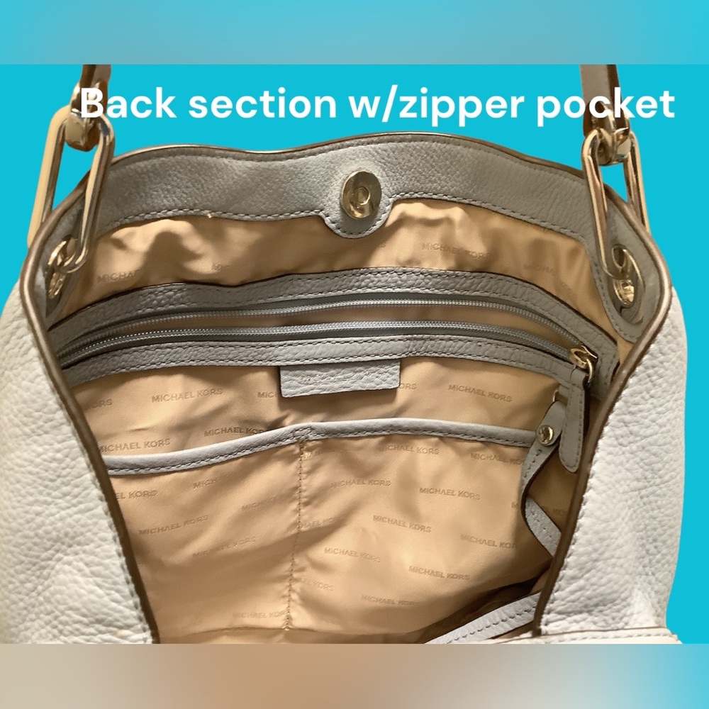 Michael Kors Light Blue Leather Shoulder Bag.
Has 3 sections for lots of storage - Picture 8 of 10